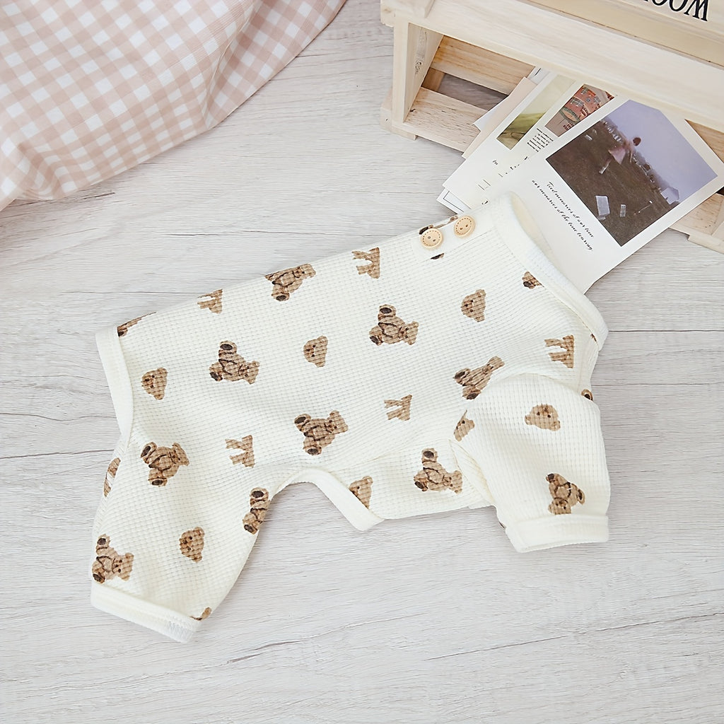 Baby blanket with bear pattern on a wooden surface