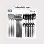 Set of silver cutlery including knives, forks, and spoons on a light gray background.