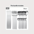 Set of silver cutlery including forks, knives, and spoons on a light gray background.