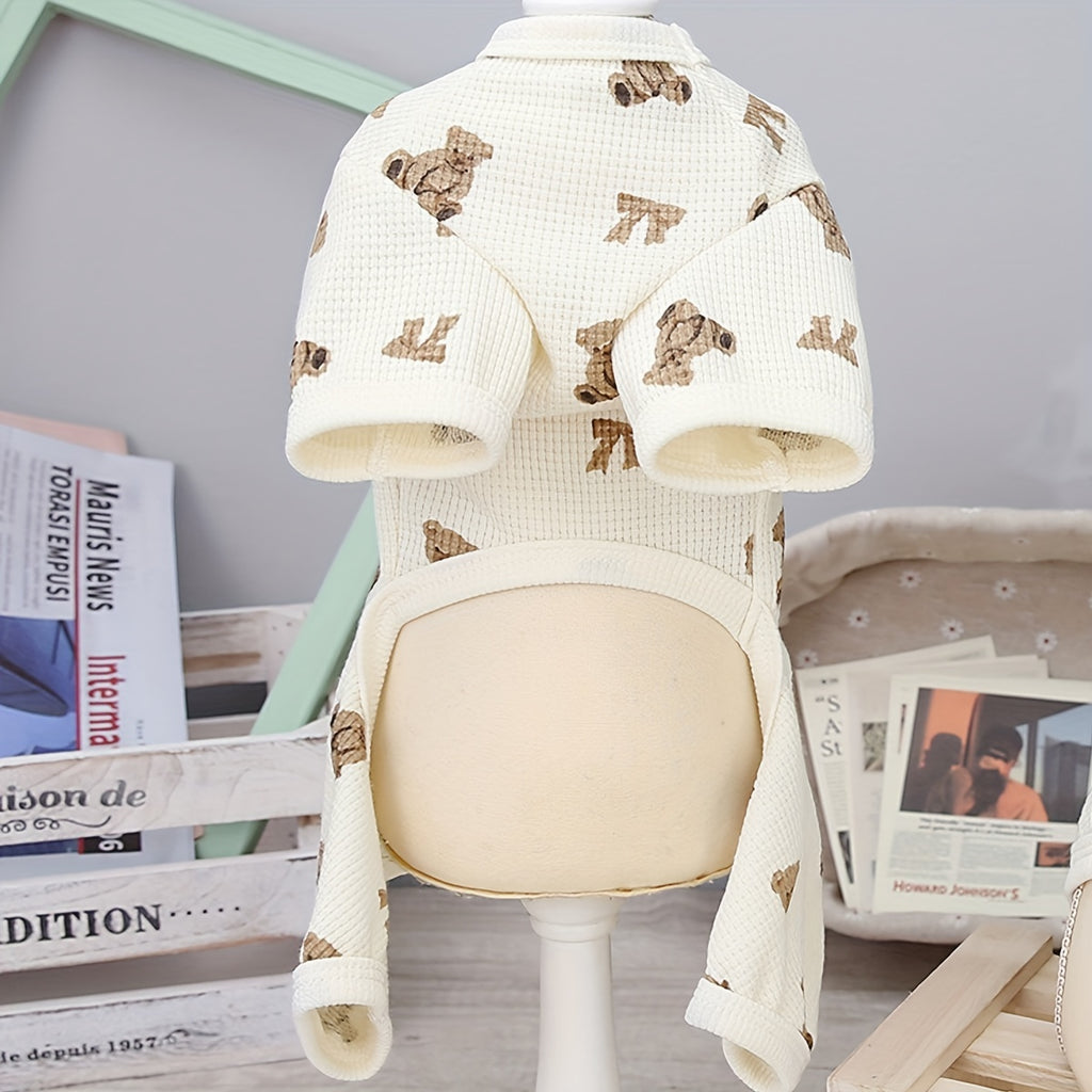 Baby romper with bear pattern on a mannequin against a neutral background