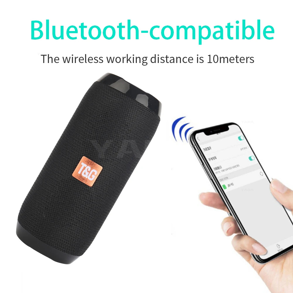 Black Bluetooth speaker with T&C logo and smartphone showing Bluetooth connection on a white background