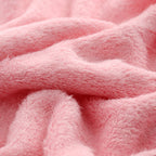 Close-up of pink fluffy fabric texture