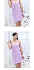 Woman wearing a light purple dress against a white background