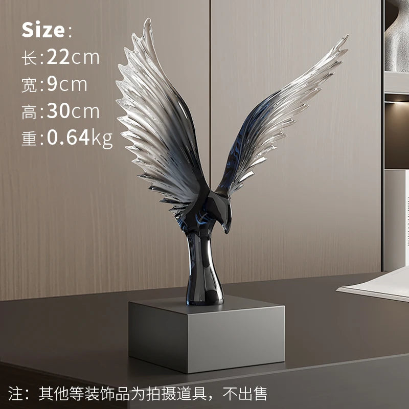 Decorative sculpture of wings on a stand with size and weight information displayed.