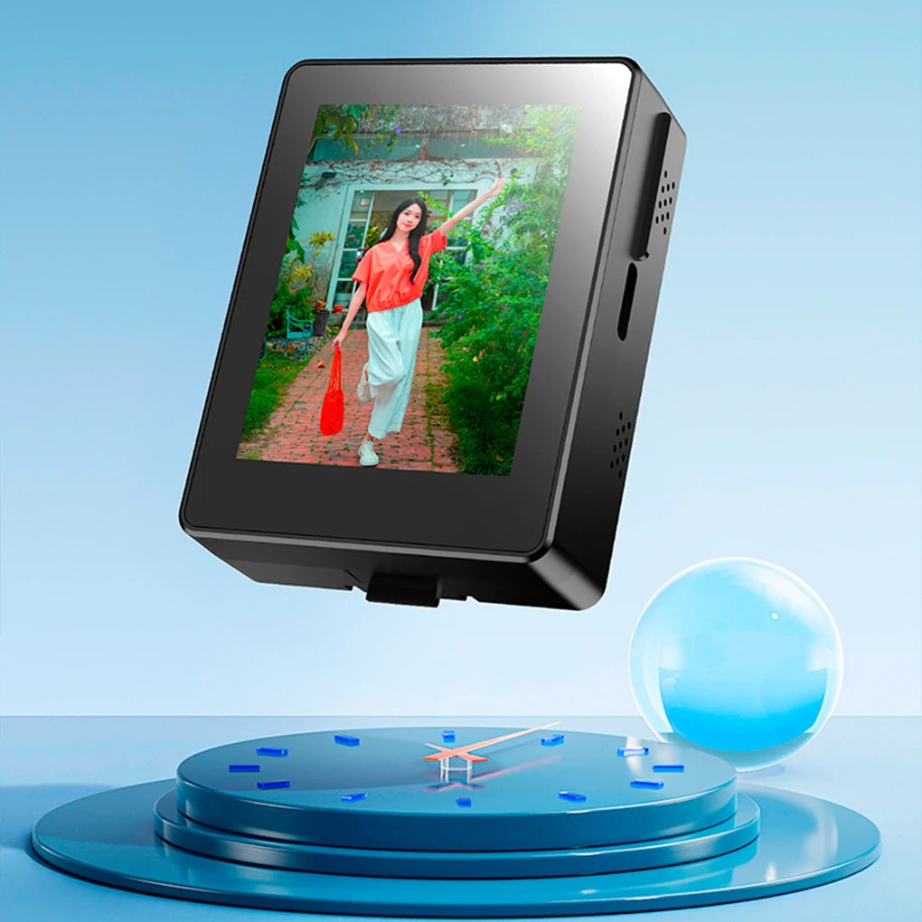 Digital photo frame displaying a woman in a garden on a blue background