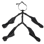 Black harness with multiple straps on a white background