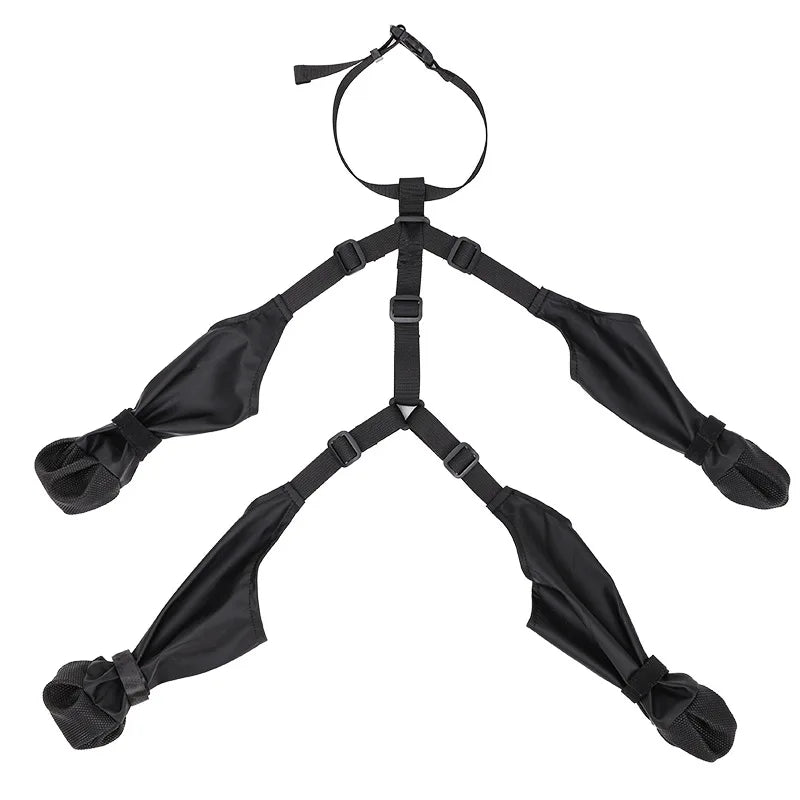 Black harness with multiple straps on a white background