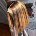 Blonde wig on a mannequin head with a blurred background