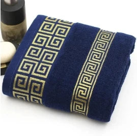 Blue towel with decorative pattern on a white background