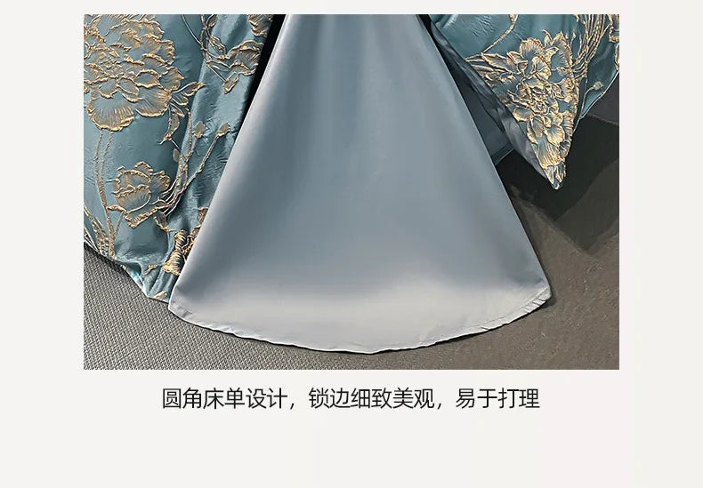 Silky fabric with floral embroidery on a plain background