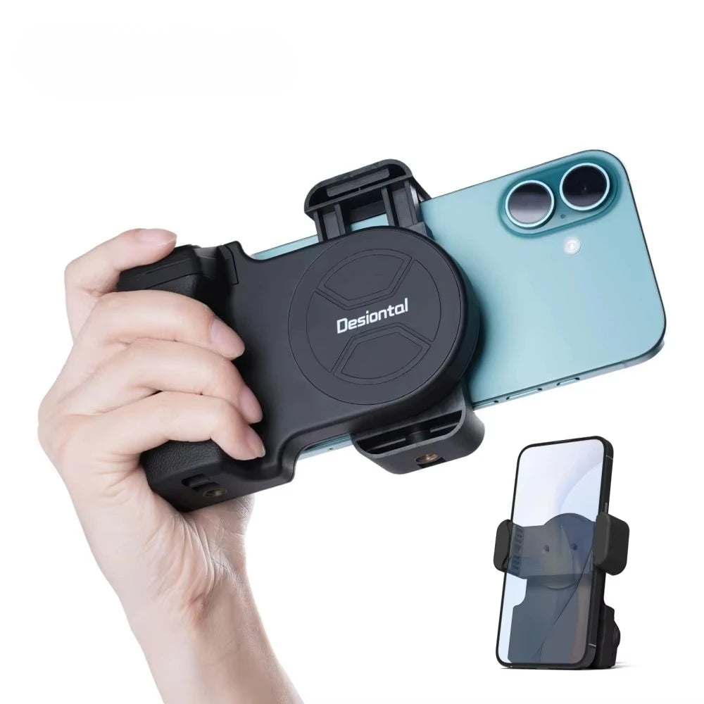 Hand holding a smartphone with a black phone holder, Desigual brand visible, on a white background.