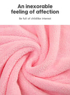 Close-up of pink fabric with text 'An inexorable feeling of affection. Be full of childlike interest.'