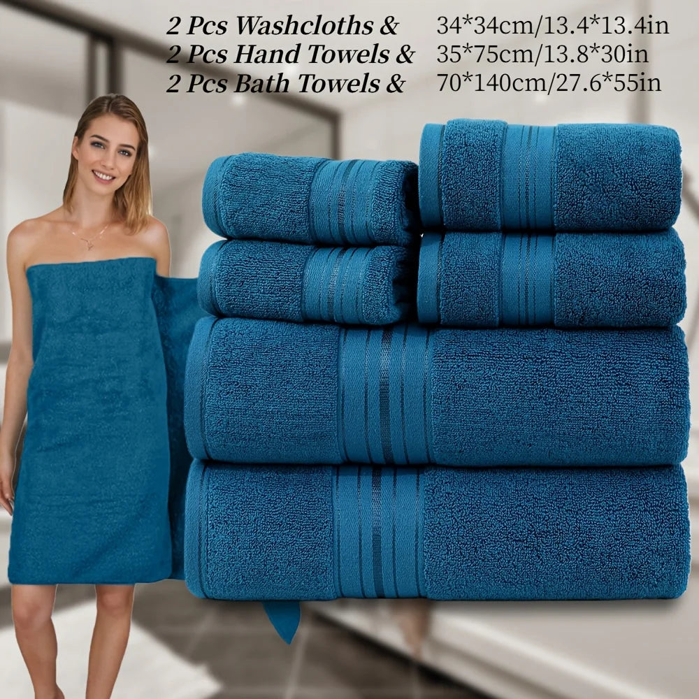 Set of blue towels with dimensions and a woman wrapped in a towel.