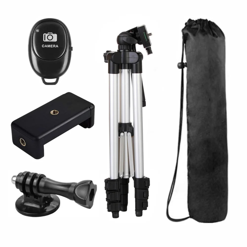 Camera accessories including a tripod, remote control, and carrying case on a white background