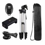 Camera accessories including a tripod, remote control, and carrying case on a white background