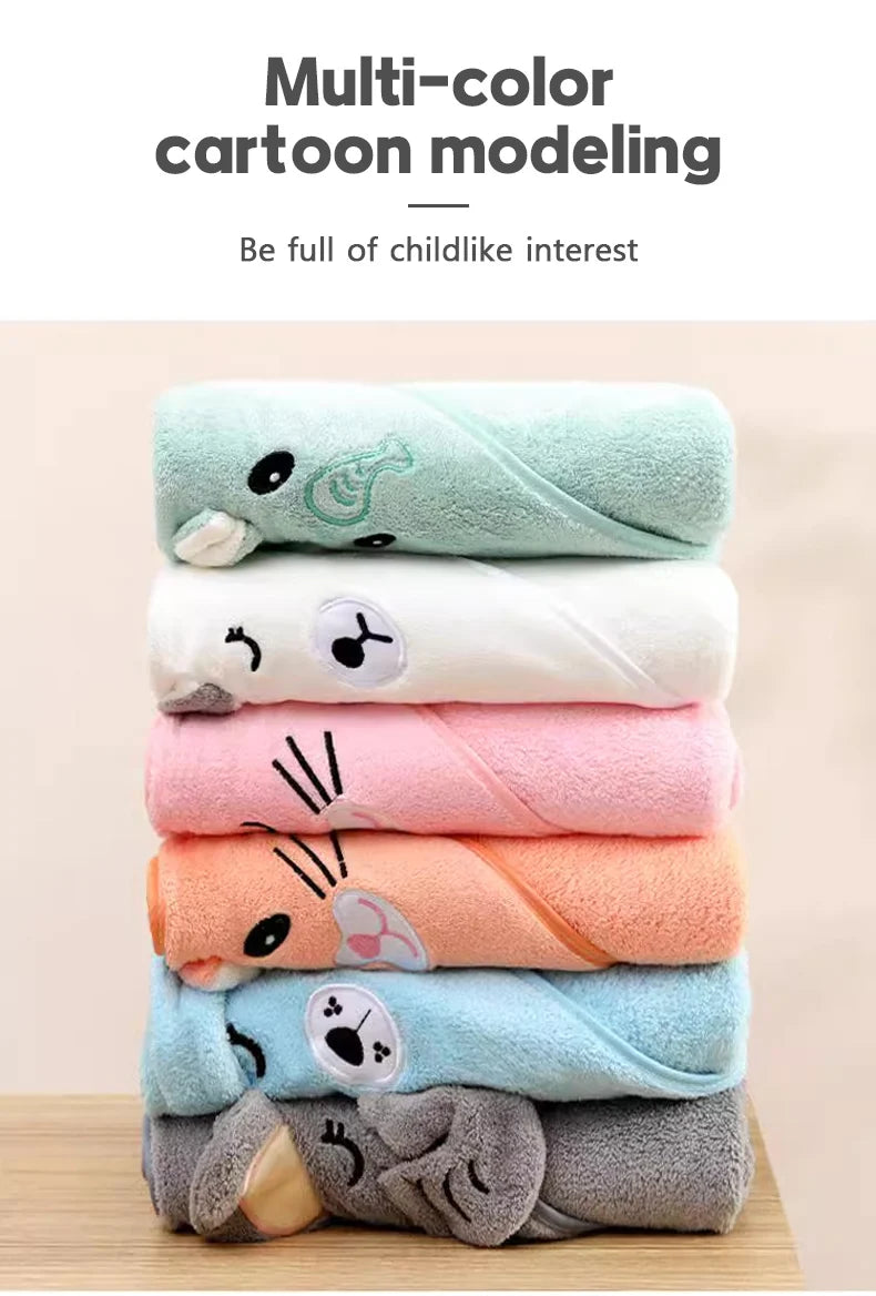 Stack of colorful cartoon-themed towels on a wooden surface with text above.