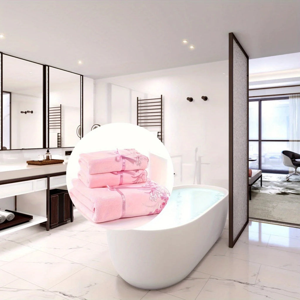 Modern bathroom with a white bathtub and pink towels