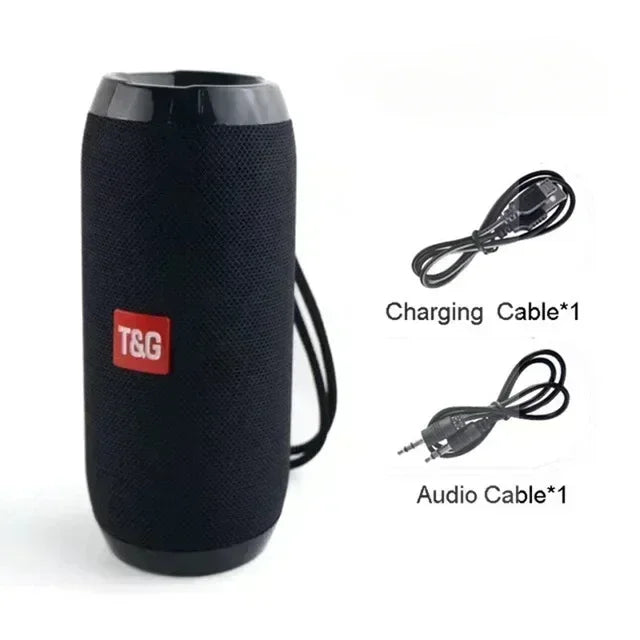 Black speaker with T&G logo, charging cable, and audio cable on a white background