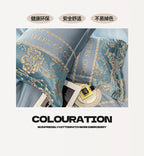 Decorative pillow with floral patterns and 'COLOURATION' branding on a light background