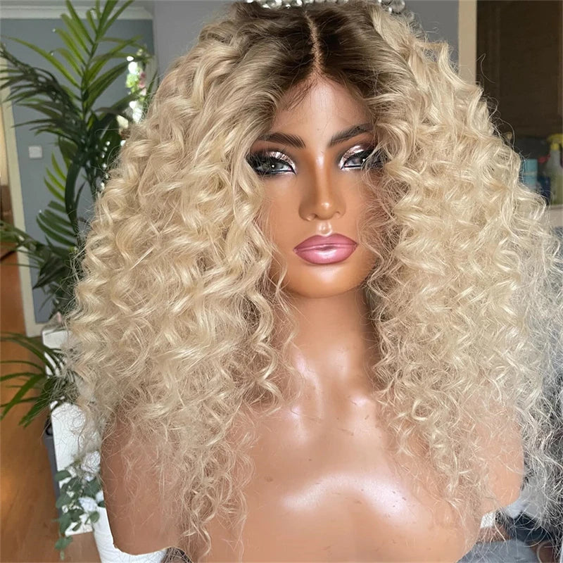 Blonde curly wig on a mannequin head with a blurred indoor background