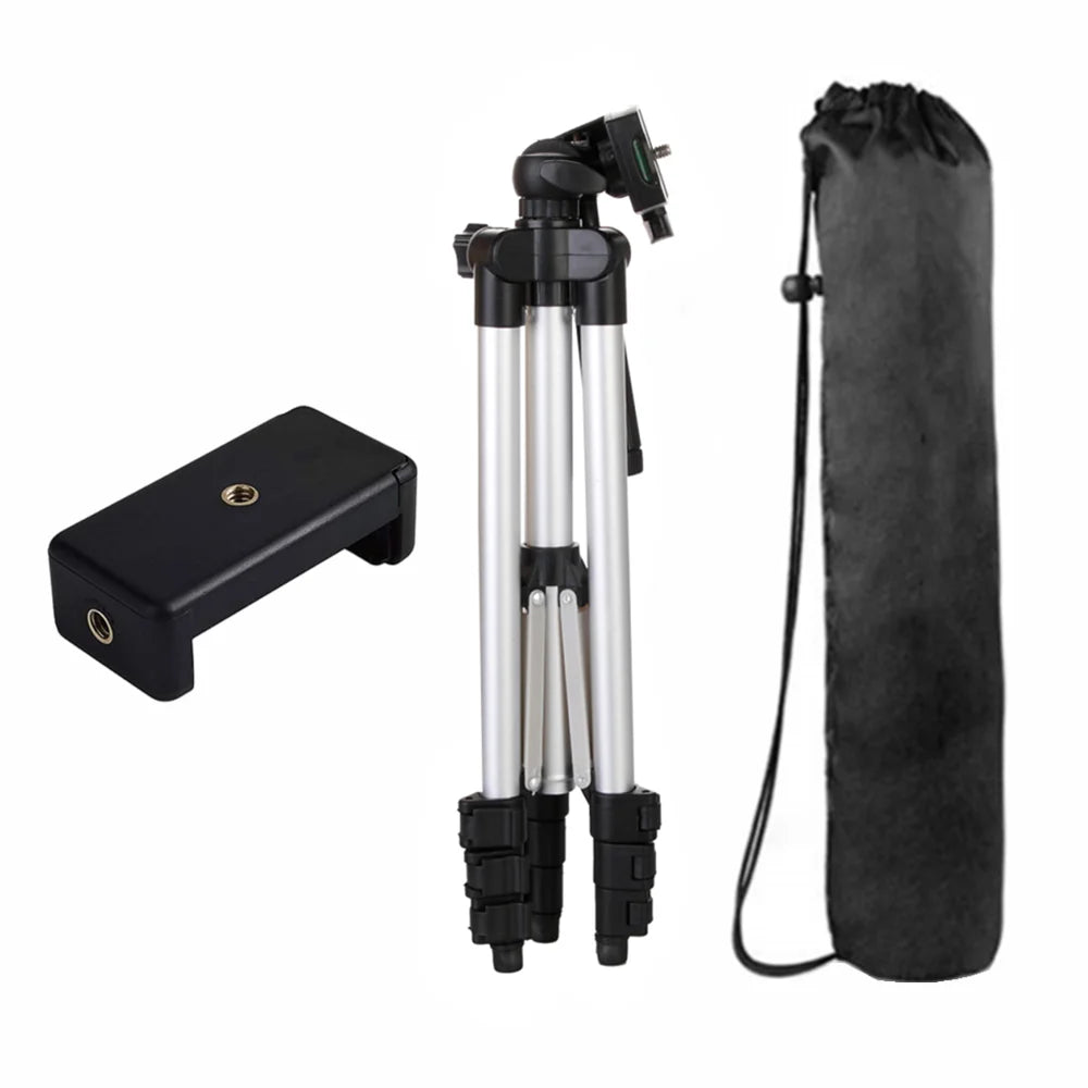 Camera tripod with carrying case and remote control on a white background