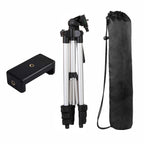 Camera tripod with carrying case and remote control on a white background