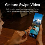 Person using a smartphone with gesture swipe video feature, wearing a ring.