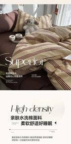 Striped bedding set with a dog lying on it, featuring the brand 'Superior'.