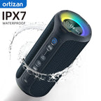 Ortizan waterproof Bluetooth speaker with water splashes on a white background