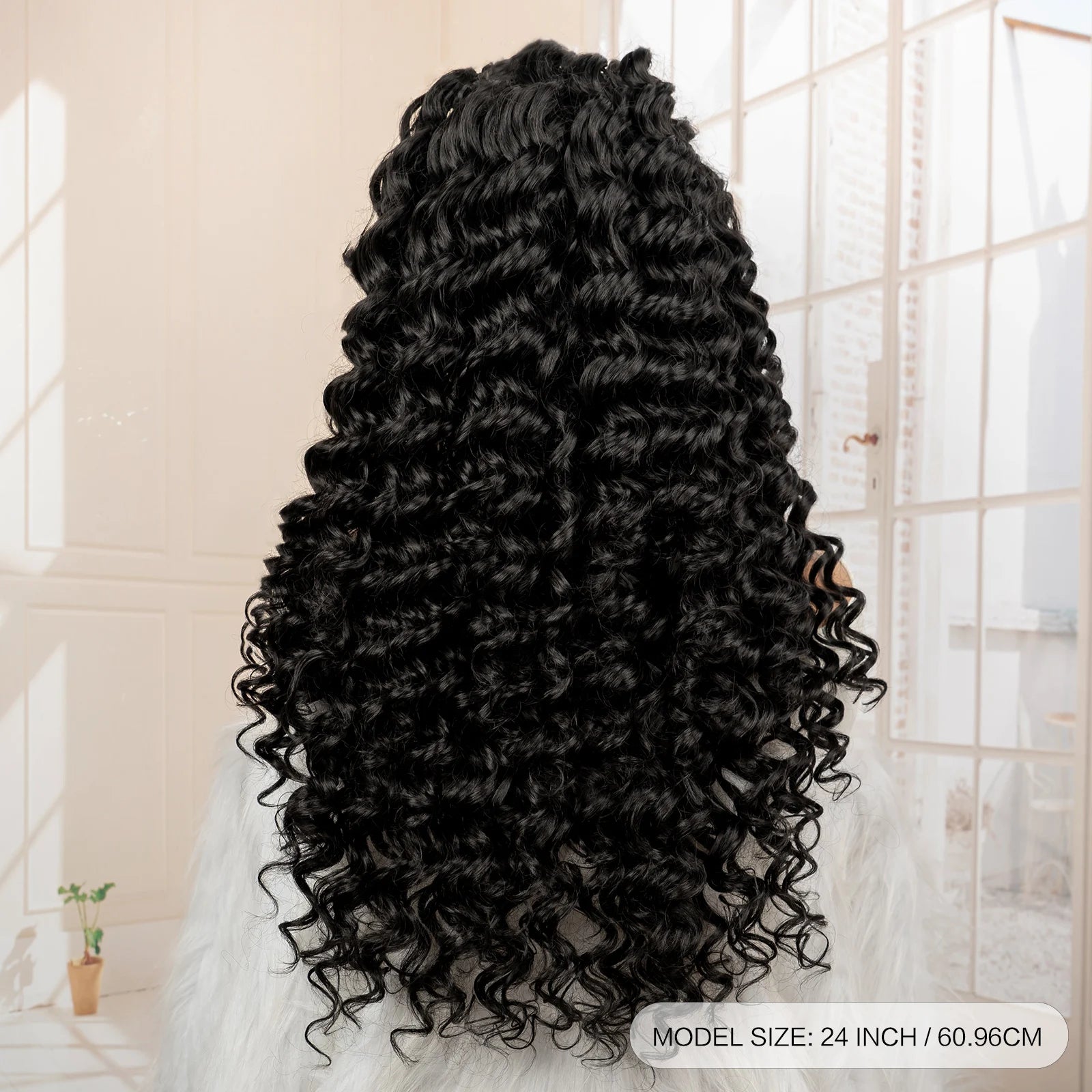 Black curly hair extension displayed against a neutral background