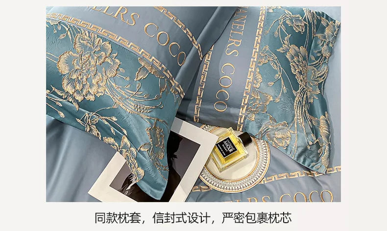 Decorative pillow with 'COCCINELLE' branding on a light blue background