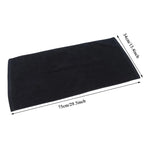Black towel with measurements on a white background