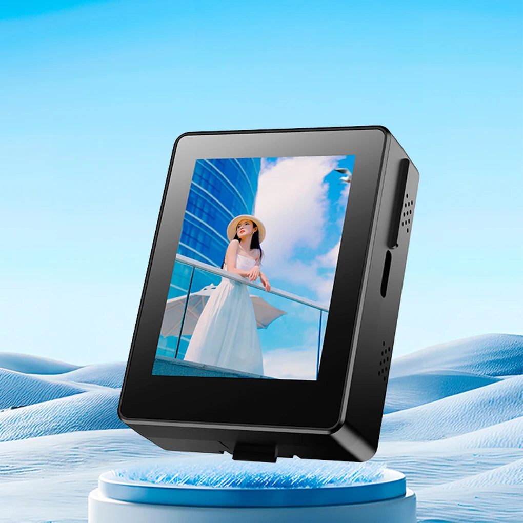 Digital photo frame displaying a woman on a balcony with a blue sky background
