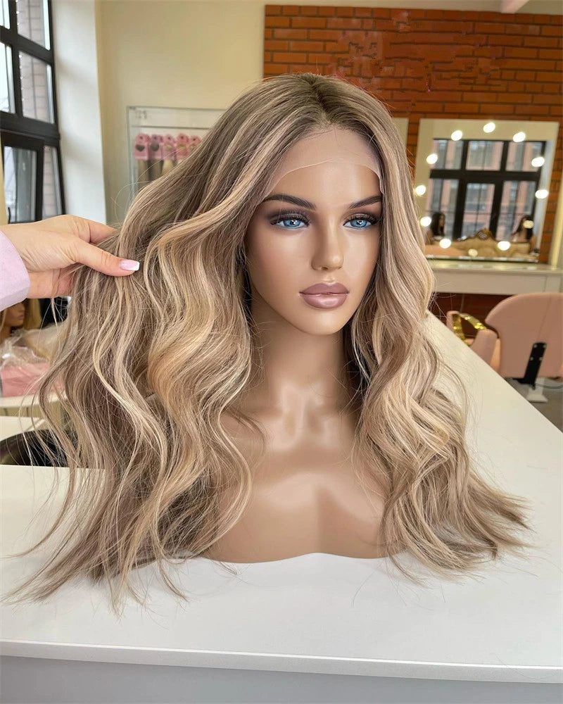 Blonde wig on a mannequin head with a blurred salon background