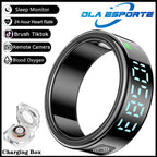 Smart ring with digital display and charging box, featuring Ola Esporte branding.