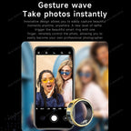 Smart ring with a phone displaying a photo of two people, set against a blurred background.