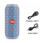 Blue and gray patterned speaker with T&G logo, charging cable, and audio cable on a white background