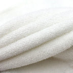 Close-up of white fluffy fabric