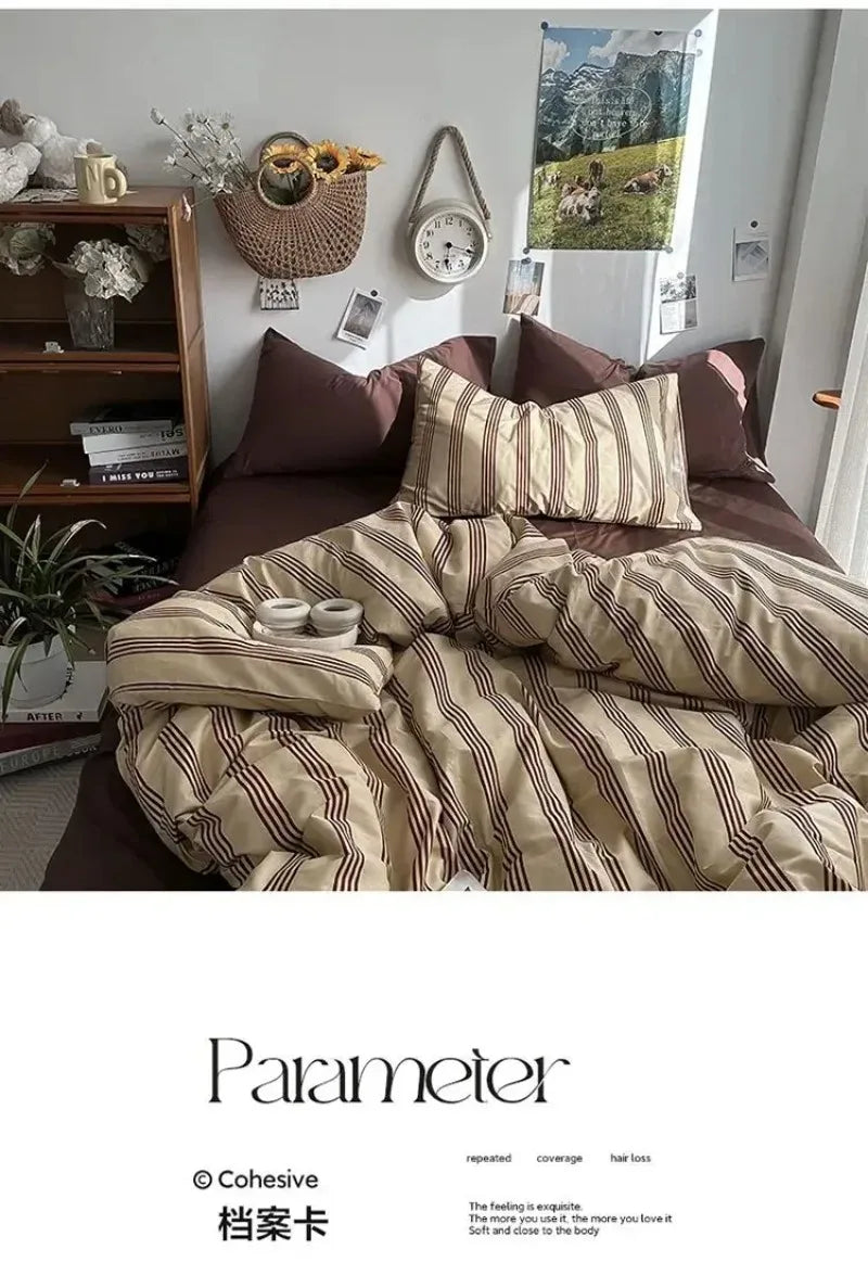Bed with striped bedding in a room with a bookshelf and decor items.
