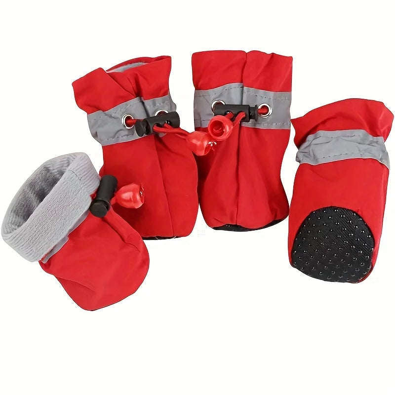 Red dog boots with gray straps on a white background