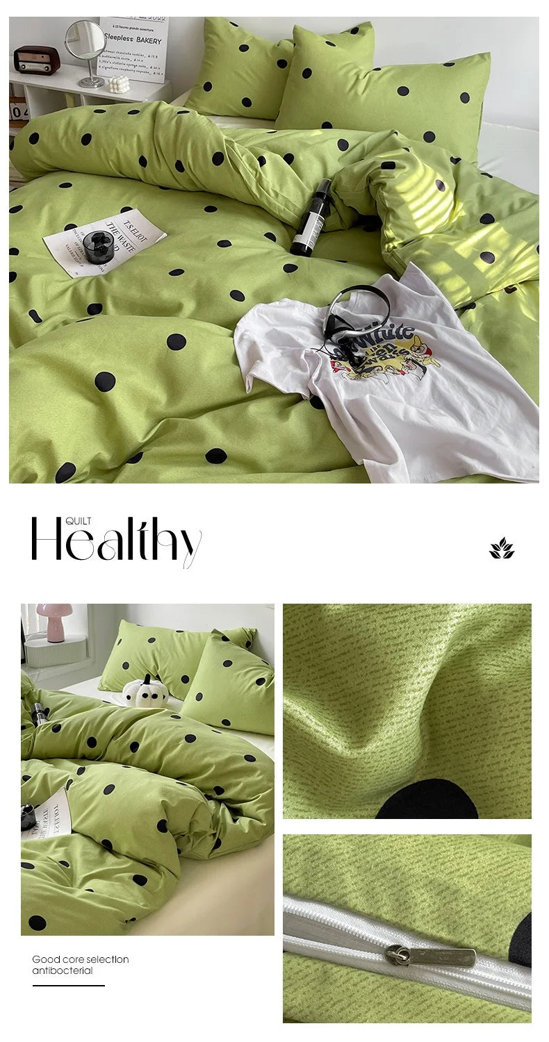 Green polka dot bedding set with close-up details on a white background
