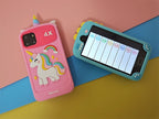 Pink unicorn phone case and teal phone case with educational app on a colorful background