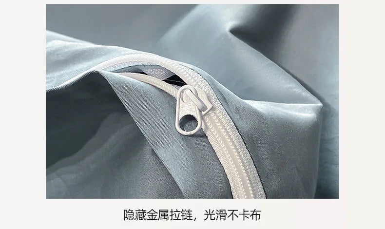 Close-up of a gray fabric with a white zipper, showing smooth texture.