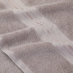 Close-up of a textured gray fabric with a subtle pattern