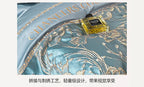 Chanel perfume bottle on a decorative fabric background
