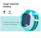 Turquoise smartwatch with charging cable on a light blue background, highlighting battery capacity and safety features.