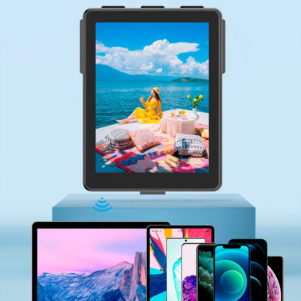 Portable screen magnifier displaying a scenic image on a blue background