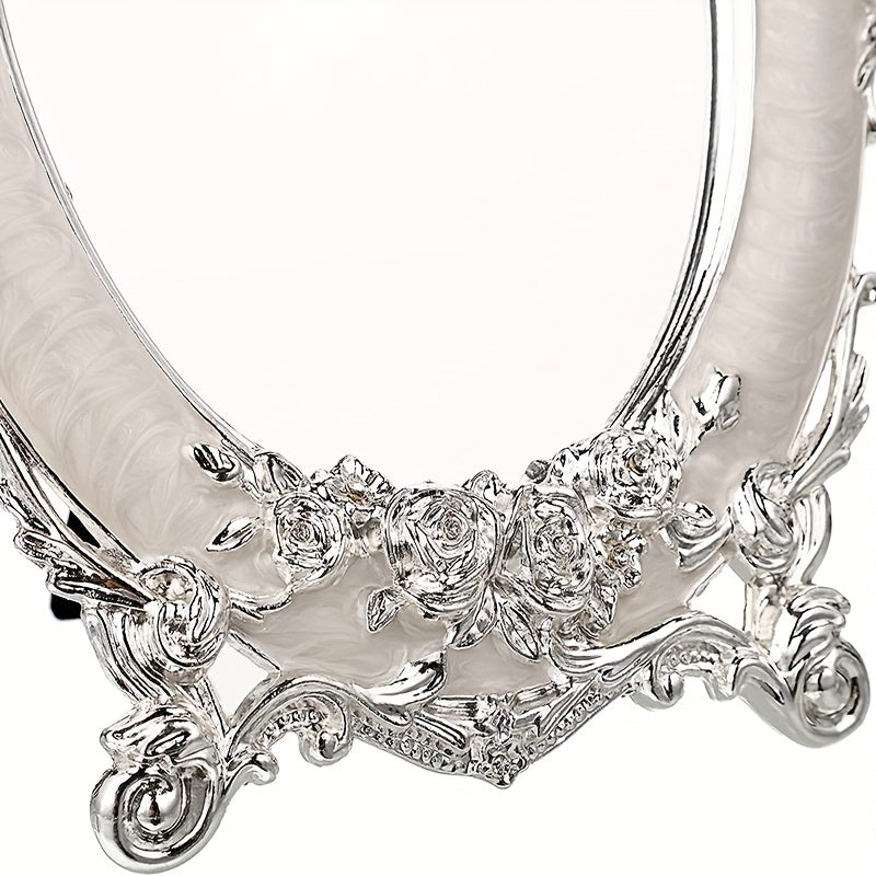 Silver necklace with floral designs on a white background